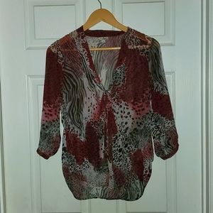 Guess blouse size small. Burgundy, black Animal print